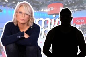 uomini e donne logo maria de filippi e sagoma uomo